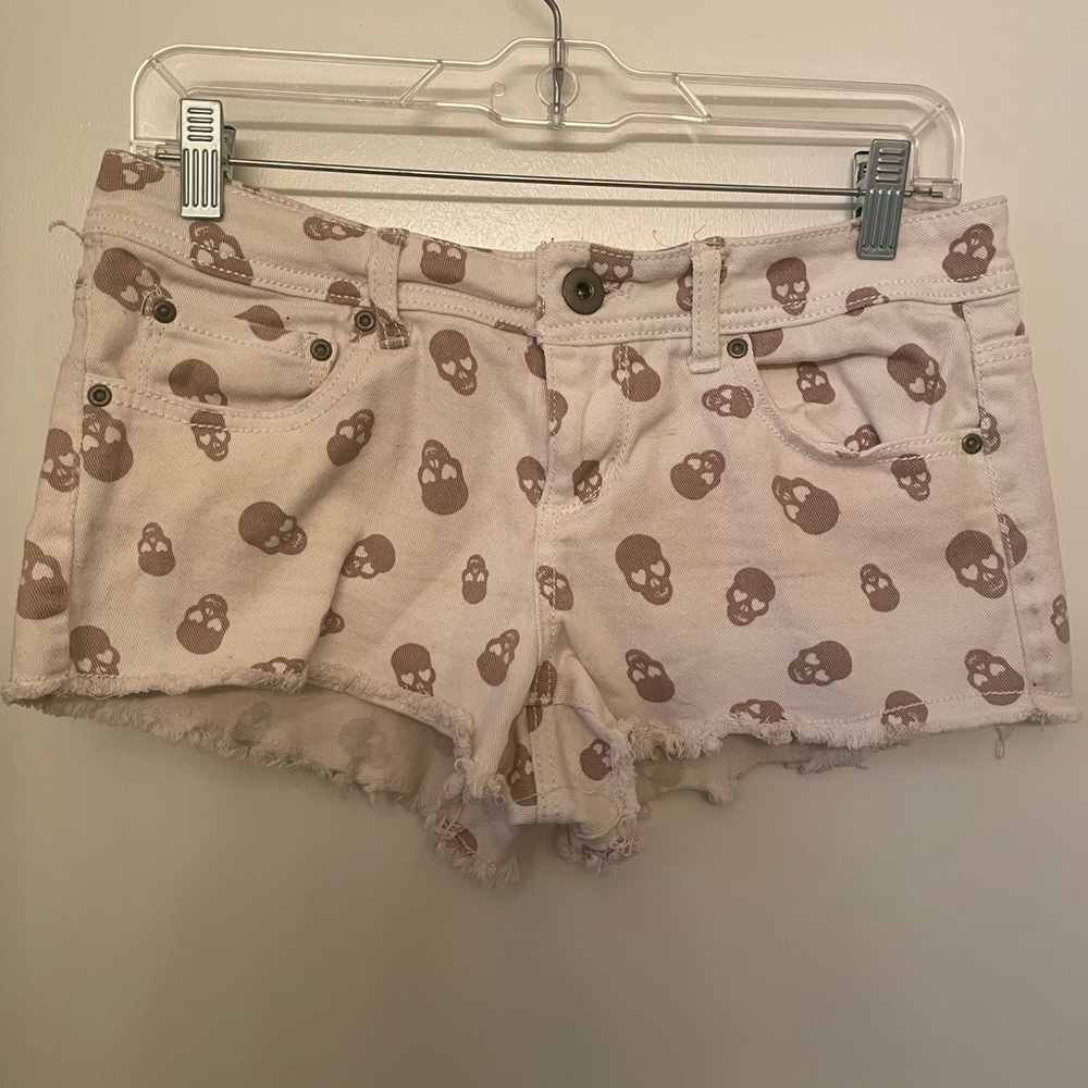 White jean shorts with skulls